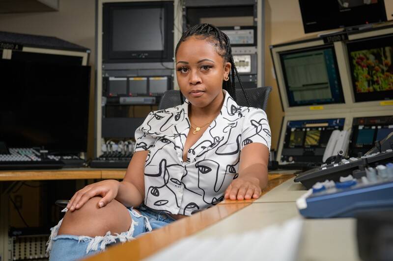 woman sitting at a workstation